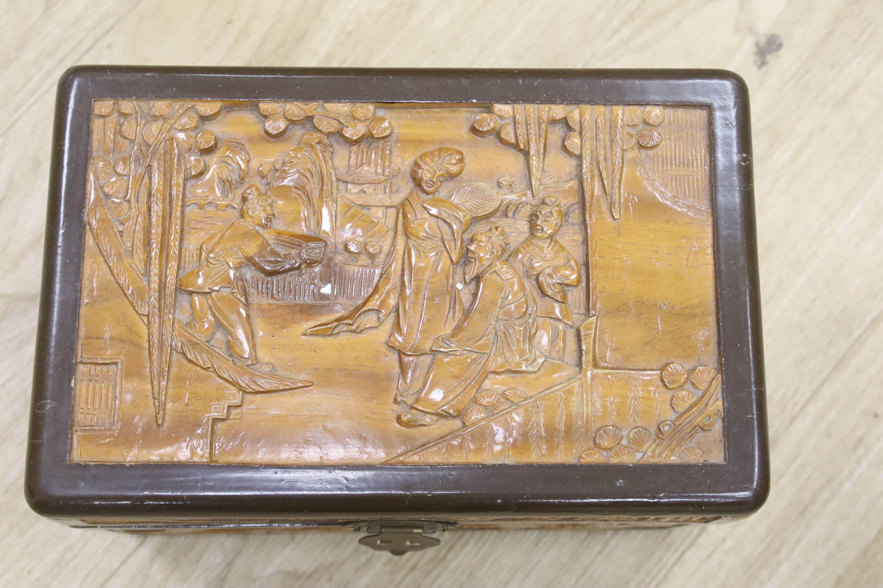 A quantity of Chinese and other carved wood boxes and wood carvings